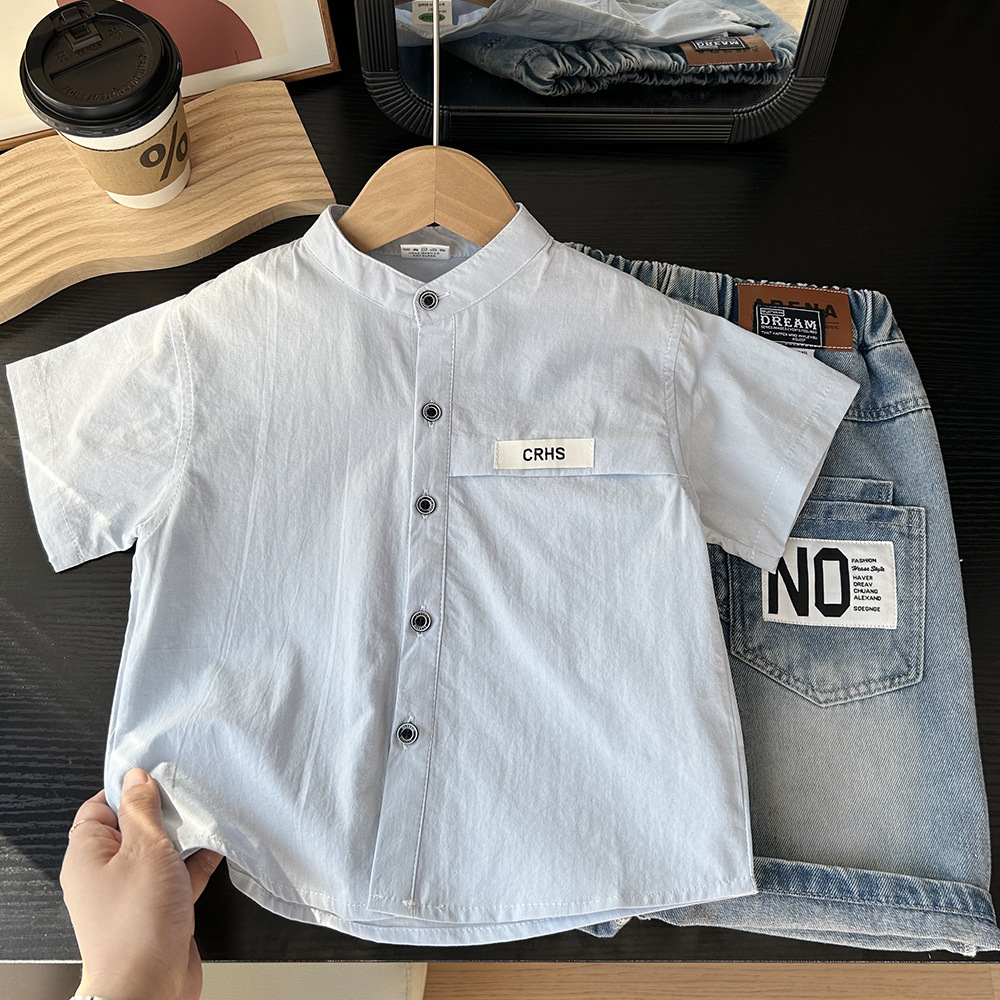 White Shirt with Black Button Detail
